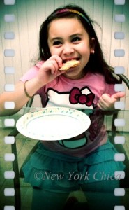 Little One trying Hungry Girl Flatbread pizza