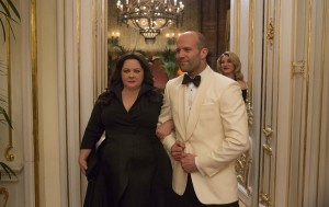 DF-04541_R2 Susan Cooper (Melissa McCarthy) and her fellow CIA operative Rick Ford (Jason Statham) pose as a “happy” couple as they go deep undercover to stop an arms dealer.